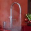 Grifo de agua hirviendo 3 en 1 Quooker Fusion Round PRO3 depósito 3 L cromado pulido